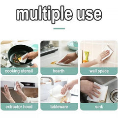 Wipes cleaning glass surfaces in kitchen