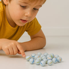 Box containing approx 30 White Glass Marbles