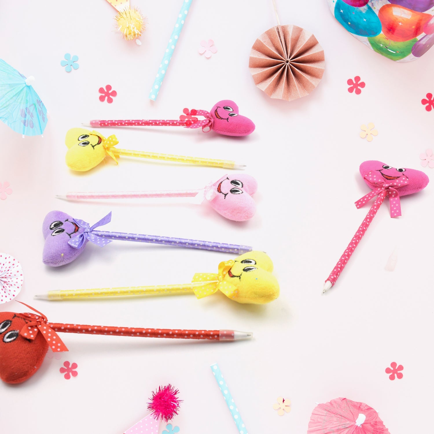 Assortment of 12 cartoon and heart design ballpoint pens with rattles
