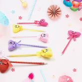 Assortment of 12 cartoon and heart design ballpoint pens with rattles