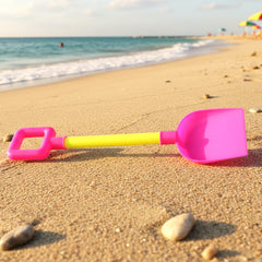 Shovel toy on sand