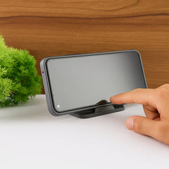 Ergonomic Black Pyramid Phone Stand holding a smartphone