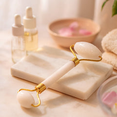 Lumi face roller with two stone heads on hand-held frame