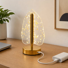 USB charging feature demonstration on leaf-shaped lamp