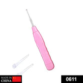 Close-up of LED Flashlight Earpick tool with illuminated tip