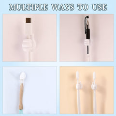 Bright white palm-shaped wall hanger installed