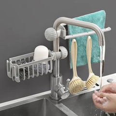 Sink organizer for towels and cleaning brushes