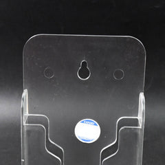 Mobile phone secured in wall mount holder