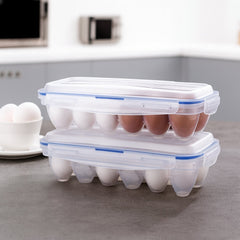 Egg box tray holding eggs with clear lid