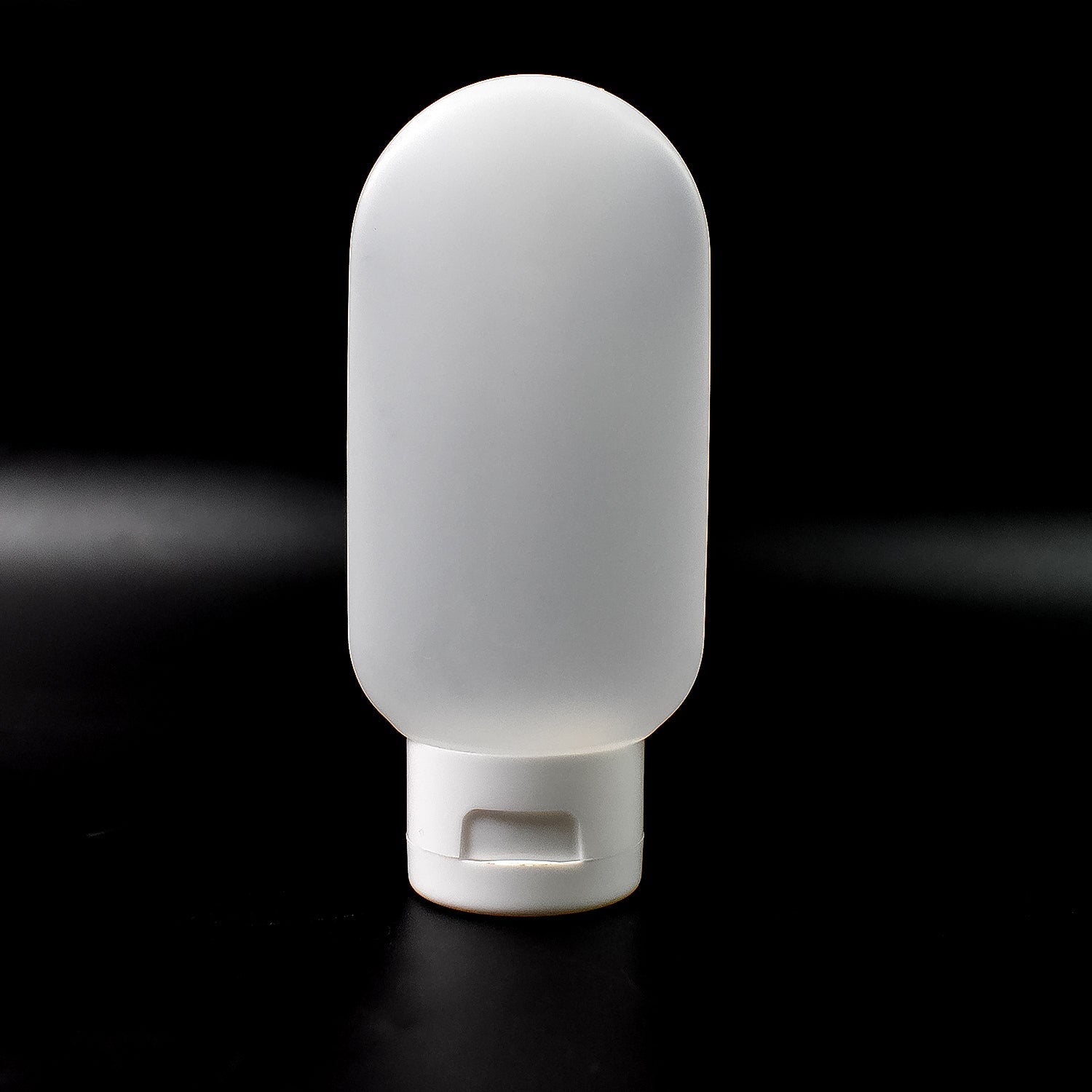 Reusable 60ml plastic travel bottle in mixed colors