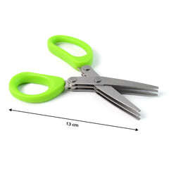 Close-up of sharp stainless steel blades on kitchen scissors