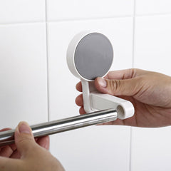 Close-up view of towel hanger bar with metal rod
