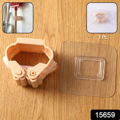 Close-up of organizer clip holding mop handle