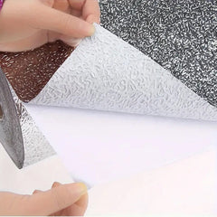 Close-up of self-adhesive aluminum foil wallpaper