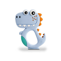 Baby holding a green dinosaur teether toy