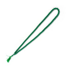 99-bead tasbih draped on a surface