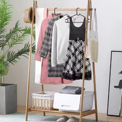 White plastic hanger holding a shirt