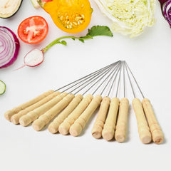 Wooden handle detail on stainless steel BBQ skewer