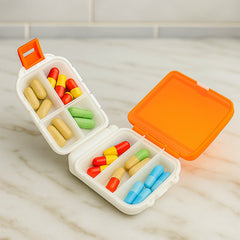 Dual-sided pill organizer box closed