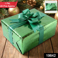 Close-up of metallic gift wrapping paper with star print