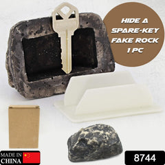 Fake rock key hider showing inside compartment