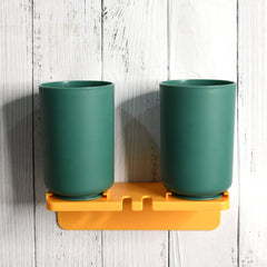 Wall mount toothbrush holder with two blue cups