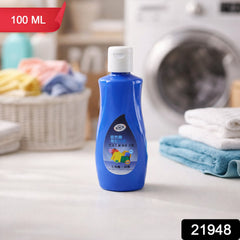 Laundry stain remover liquid applied on fabric