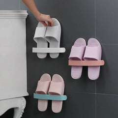StickNStore towel and slipper rack fixed on bathroom wall