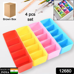 Desktop organizer box showing multiple compartments with socks and underwear