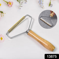 Double-Sided Lint Remover in use on fabric