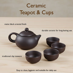 Black ceramic teapot with ergonomic handle