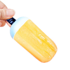 Six colorful kulfi molds on tray