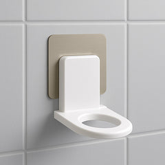 Wall-mounted adhesive hook for shampoo and soap bottle