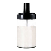 Single glass spice jar with attached spoon and leakproof lid