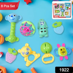 Child playing with colorful rattle toy