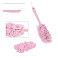 Long handle loofah body scrubber in bathroom