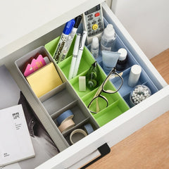 Clear plastic storage tray with dividers for organizing small craft items India