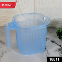 Clear plastic square mug with water