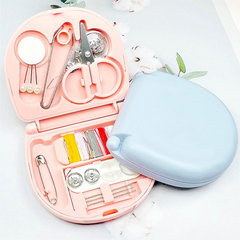 Mini travel sewing kit closed in plastic case