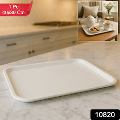 Durable plastic serving tray holding two coffee cups and a snack bowl.