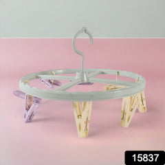 Laundry drying rack with clips in use