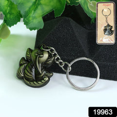 Ganesh Face antique black metal keychain, close-up on details