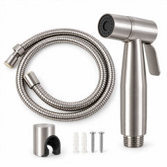 A complete set of the brushed steel bidet sprayer, coiled hose, wall holder, and mounting hardware is arranged neatly on a