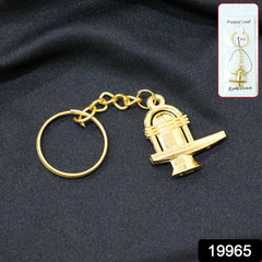 Golden Shivling metal keychain close-up