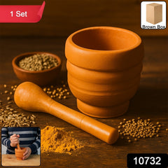 Plastic mortar and pestle with crushed spices inside