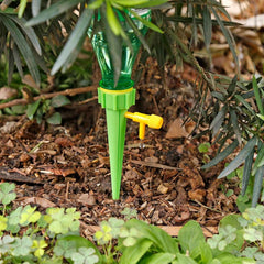 Set of six adjustable self-watering spikes for plants