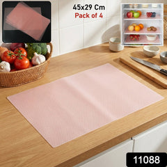 Plastic fridge liner mat on refrigerator shelf