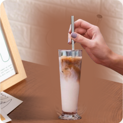 Bent and straight stainless steel straws side by side