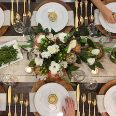 Golden dessert spoons in the premium cutlery set