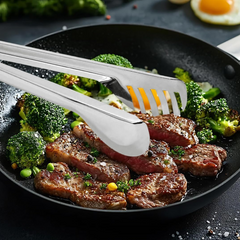 Stainless steel tong serving pasta
